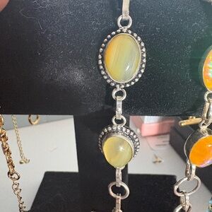 Elegant Silver and Yellow Gemstone Bracelet